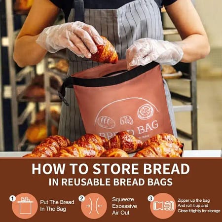 Bakery worker storing fresh croissants in an eco-friendly reusable bread bag with storage instructions.