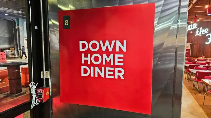 Sign for down home diner a cozy philly diner inside reading terminal market
